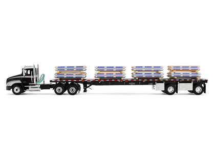 Mack Pinnacle Day Cab with Minimizer Parts & 53' Wilson Roadbrute Flatbed Trailer with "Carlisle Roofing" Loaded Pallets Black with Silver Top and Stripes 1/64 Diecast Model