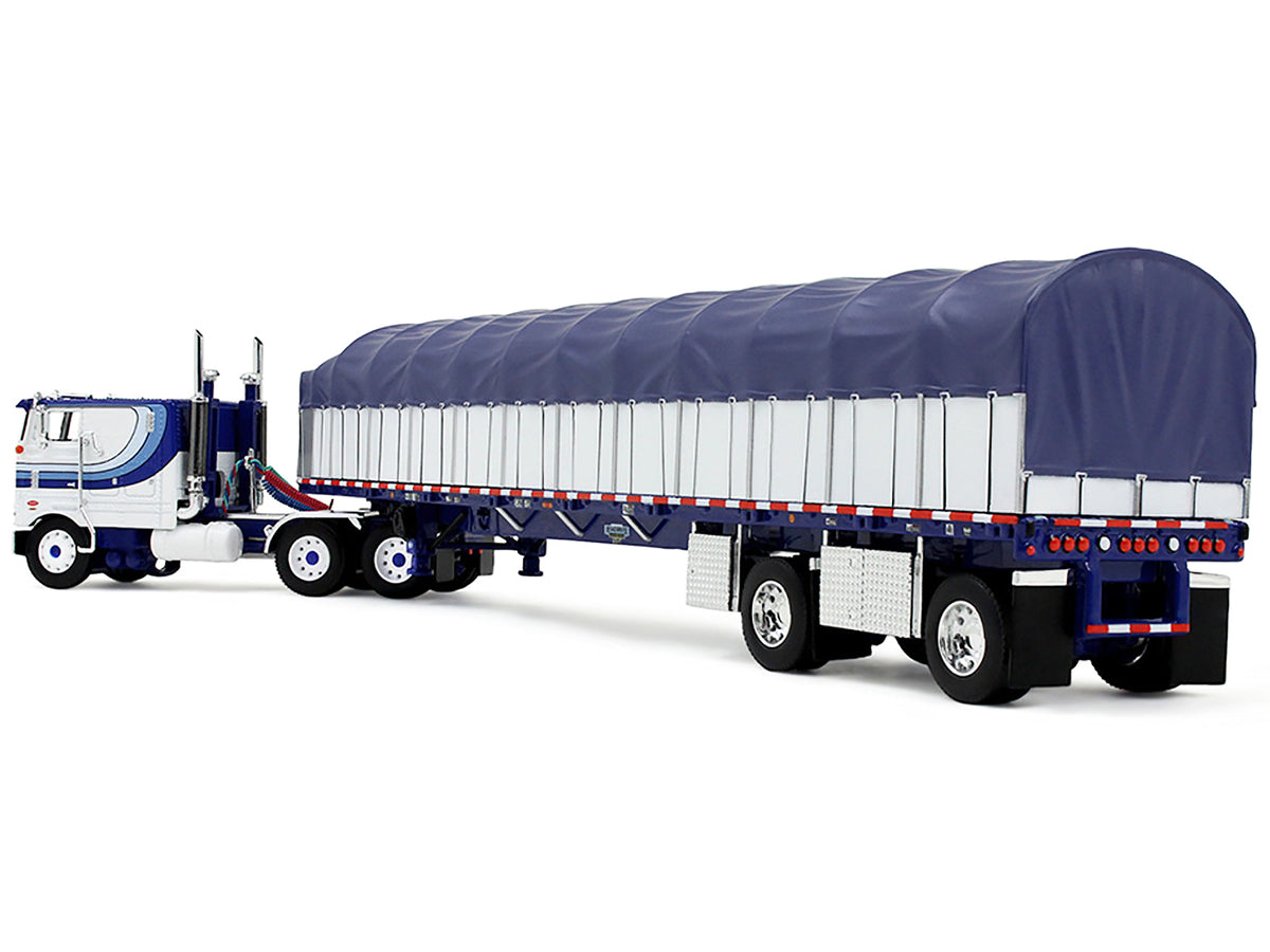 Peterbilt 352 COE 110" Sleeper and 53’ Wilson Roadbrute Flatbed Trailer with Covered Wagon White with Blue Stripes 1/64 Diecast Model