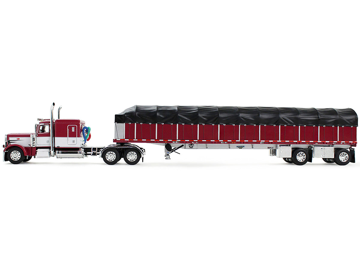 Peterbilt 389 with 63" Flat Top Sleeper and 53’ Wilson Roadbrute Flatbed Trailer with Covered Wagon Maroon with White Stripes 1/64 Diecast Model