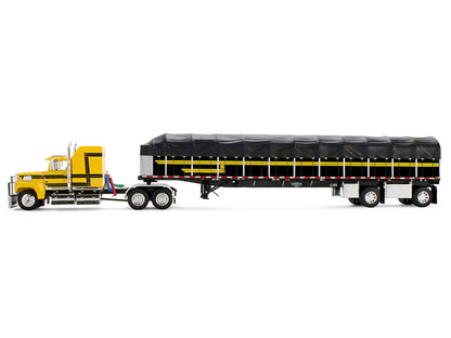Ford LTL 9000 with 60" Aerodyne Sleeper and 53' Wilson Roadbrute Flatbed Trailer with Covered Wagon Yellow with Black Stripes 1/64 Diecast Model