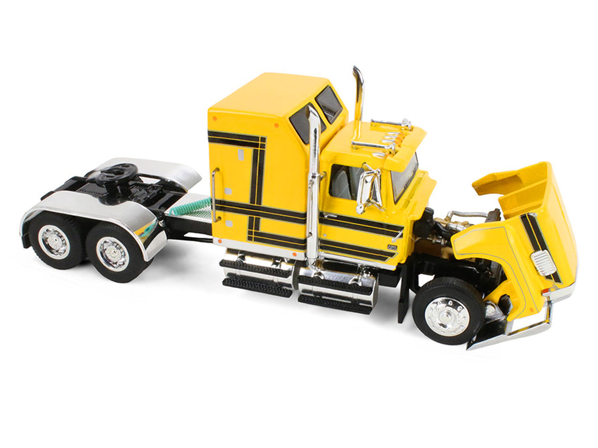 Ford LTL 9000 with 60" Aerodyne Sleeper and 53' Wilson Roadbrute Flatbed Trailer with Covered Wagon Yellow with Black Stripes 1/64 Diecast Model