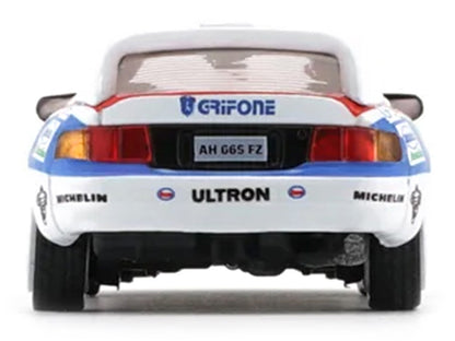Toyota Celica GT-Four #21 Gilberto Pianezzola - Loris Roggia "Rallye Sanremo - Rallye d'Italia" (1996) with Extra Wheels 1/64 Diecast Model Car