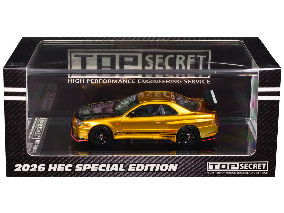 Nissan "Top Secret" Skyline GT-R (BNR34) RHD (Right Hand Drive) Gold Metallic with Carbon Hood "Hobby Expo China 2026" 1/64 Diecast Model Car