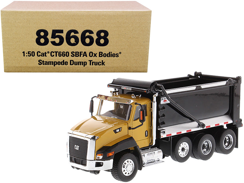 CAT Caterpillar CT660 SBFA with Ox Bodies Stampede Dump Truck Yellow and Black 1/50 Diecast Model
