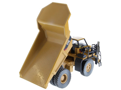 CAT Caterpillar 770 Off-Highway Truck Yellow (Weathered) with Operator "Weathered" Series 1/50 Diecast Model