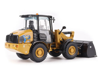 CAT Caterpillar 906 Electric Compact Wheel Loader Yellow with Operator "High Line Series" 1/50 Diecast Model