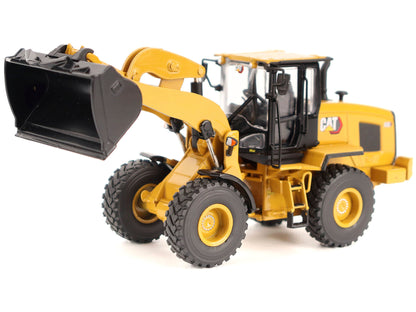 CAT Caterpillar 930 Wheel Loader with Operator Yellow "High Line" Series 1/50 Diecast Model
