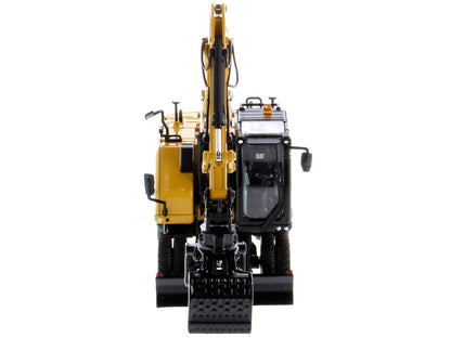 CAT Caterpillar M318 Wheeled Excavator Yellow with Operator "High Line" Series 1/50 Diecast Model