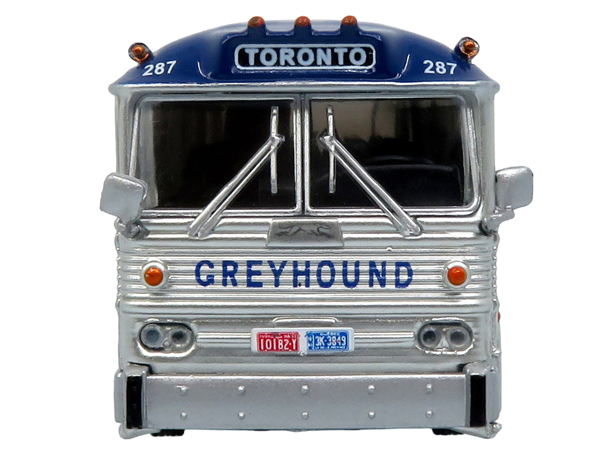 1964 MCI MC-5A Coach Bus "Greyhound Canada" White with Blue Stripes "Vintage Bus & Motorcoach Collection" Limited Edition to 504 pieces Worldwide 1/87 (HO) Diecast Model