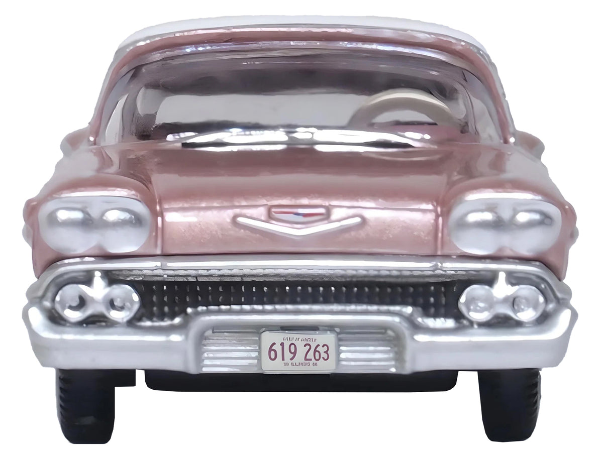 1958 Chevrolet Impala Sport Cay Coral Pink Metallic with White Top 1/87 (HO) Scale Diecast Model Car