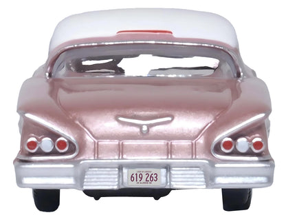 1958 Chevrolet Impala Sport Cay Coral Pink Metallic with White Top 1/87 (HO) Scale Diecast Model Car