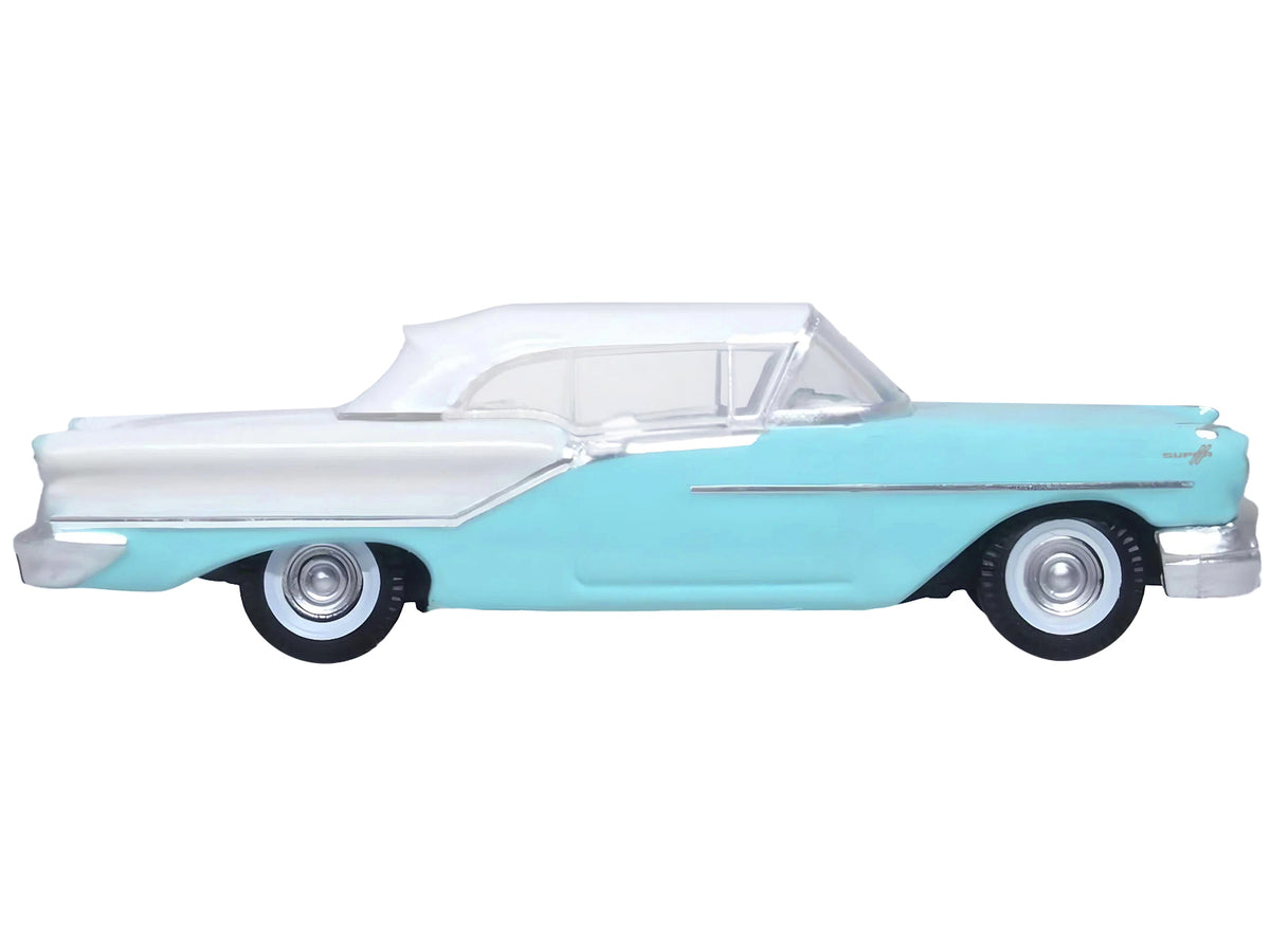1957 Oldsmobile 88 Convertible (Top-Up) Banff Blue and Alcan White with White 1/87 (HO) Scale Diecast Model Car