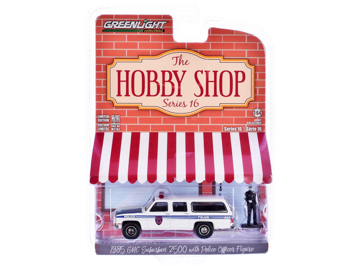 1985 GMC Suburban 2500 "New York City Transit Police Department" White with Blue Stripes and Police Officer Figure "The Hobby Shop" Series 16 1/64 Diecast Model Car