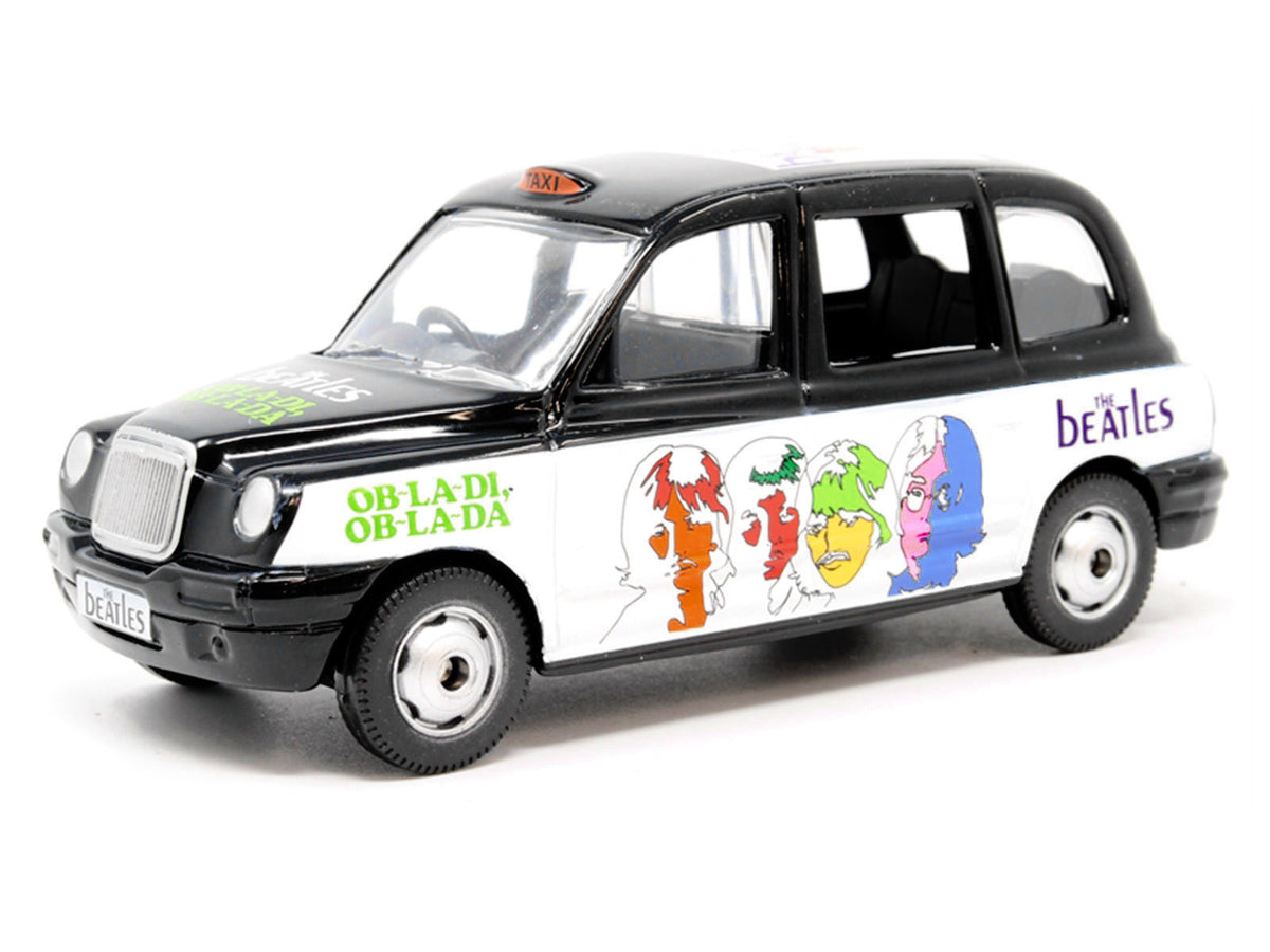 The Beatles London Taxi RHD (Right Hand Drive) "Ob-La-Di Ob-La-Da" Black and White with Graphics Diecast Model