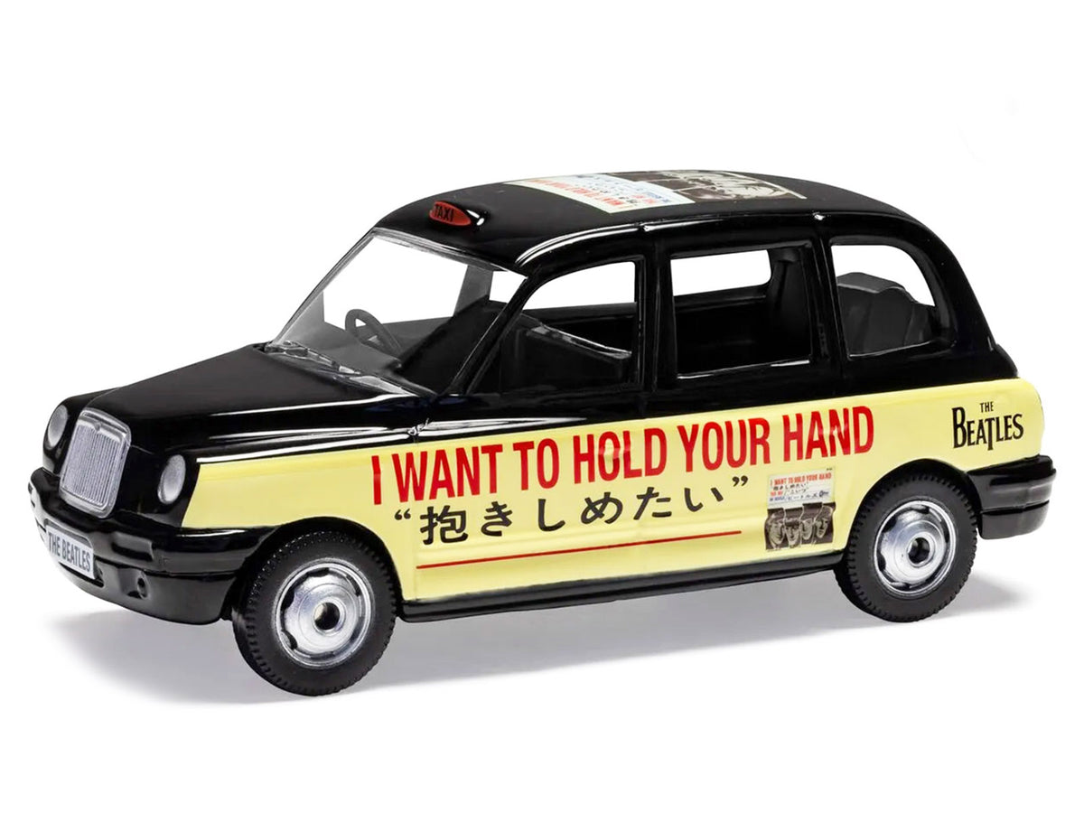 The Beatles London Taxi RHD (Right Hand Drive) "I Want To Hold Your Hand" Black and Cream with Graphics Diecast Model