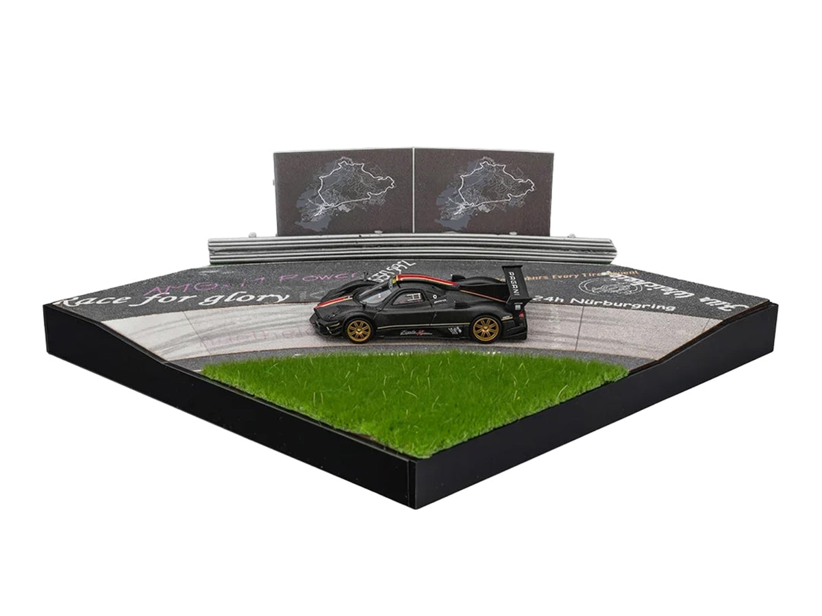 Nurburgring Diorama Set with Pagani Zonda Revolucion Carbon with Red and Gold Stripes and Extra Wheels 1/64 Diecast Model Car