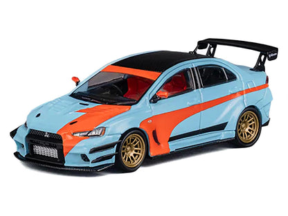 Mitsubishi Lancer Evolution X Varis RHD (Right Hand Drive) Light Blue with Black Top and Orange Stripes 1/64 Diecast Model Car