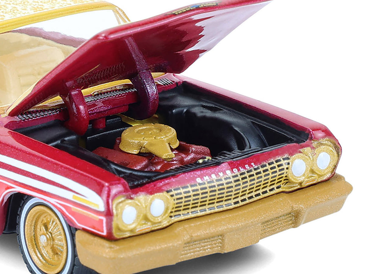 1963 Chevrolet Impala Lowrider "Michael Heralda Special Edition" Red Metallic with Cream Top and Interior with Gold Graphics "Hobby Exclusive" Series 1/64 Diecast Model Car