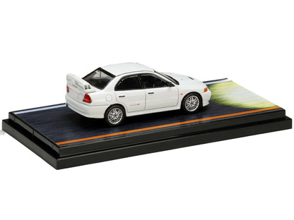 Mitsubishi Lancer RS Evolution IV RHD (Right Hand Drive) White "Monstar" with Seiji Iwaki Driver Figure "Initial D" (1995-2013) Manga 1/64 Diecast Model Car