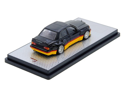 Pandem Rocket Bunny 190E Black with Red and Yellow Stripes "Diecast Con Madrid 2026 Event Edition" 1/64 Diecast Model Car