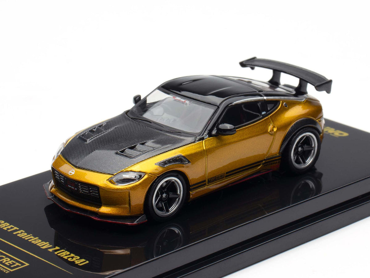 Nissan Fairlady Z Top Secret (RZ34) RHD (Right Hand Drive) Gold Metallic with Carbon Hood and Black Top 1/64 Diecast Model Car
