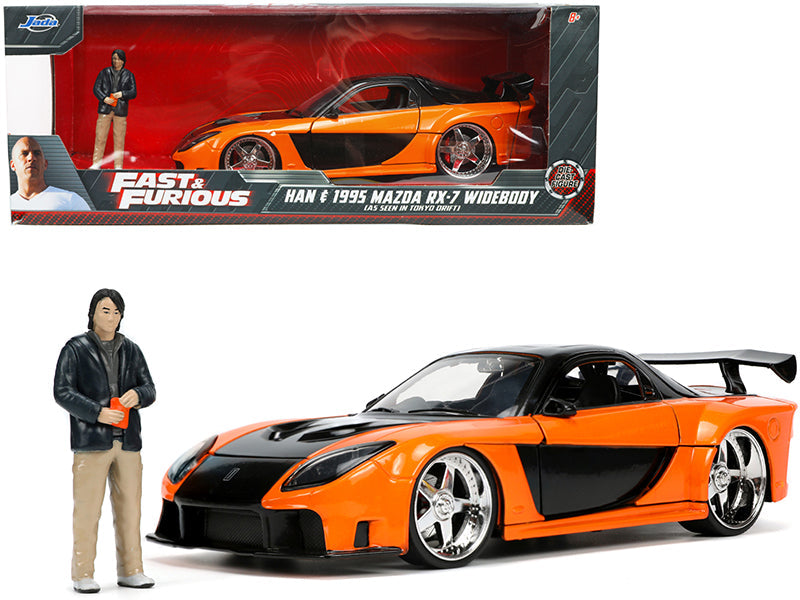 1995 Mazda RX-7 Widebody RHD (Right Hand Drive) Orange Metallic and Black with Han Diecast Figurine "The Fast and the Furious: Tokyo Drift" (2006) Movie 1/24 Diecast Model Car