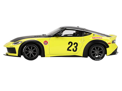 Nissan Z "LB-Nation Works" #23 Ikazuchi Yellow with Black Hood and Top Limited Edition 1/64 Diecast Model Car