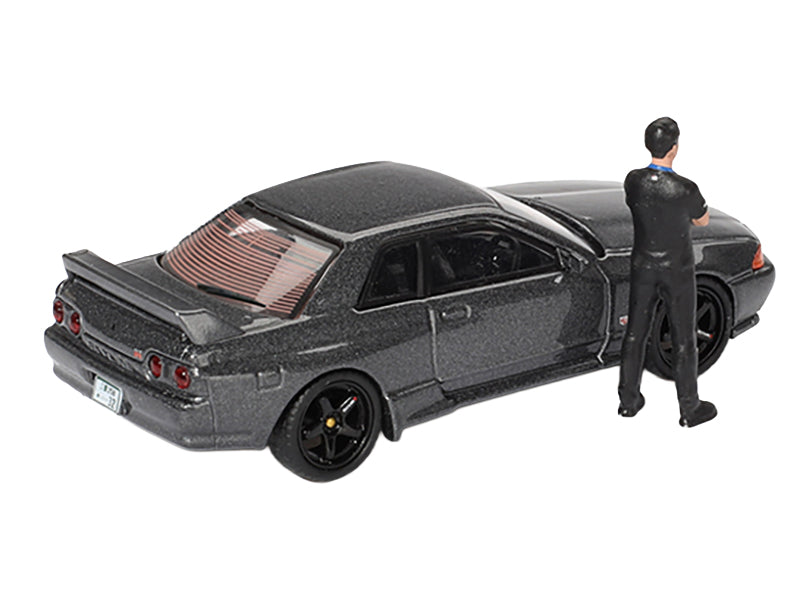 Nissan Skyline GT-R (R32) RHD (Right Hand Drive) Gunmetal Gray Metallic with Tsugio Matsuda Figure Limited Edition 1/64 Diecast Model Car