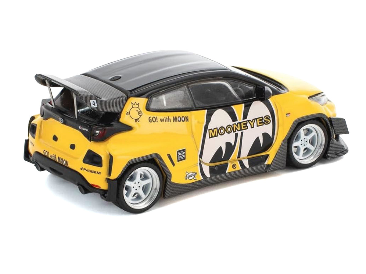 Pandem GR Yaris RHD (Right Hand Drive) "MoonEyes" Yellow with Black Top and Graphics "Enigma Exclusive Edition 1/64 Die Cast Model Car