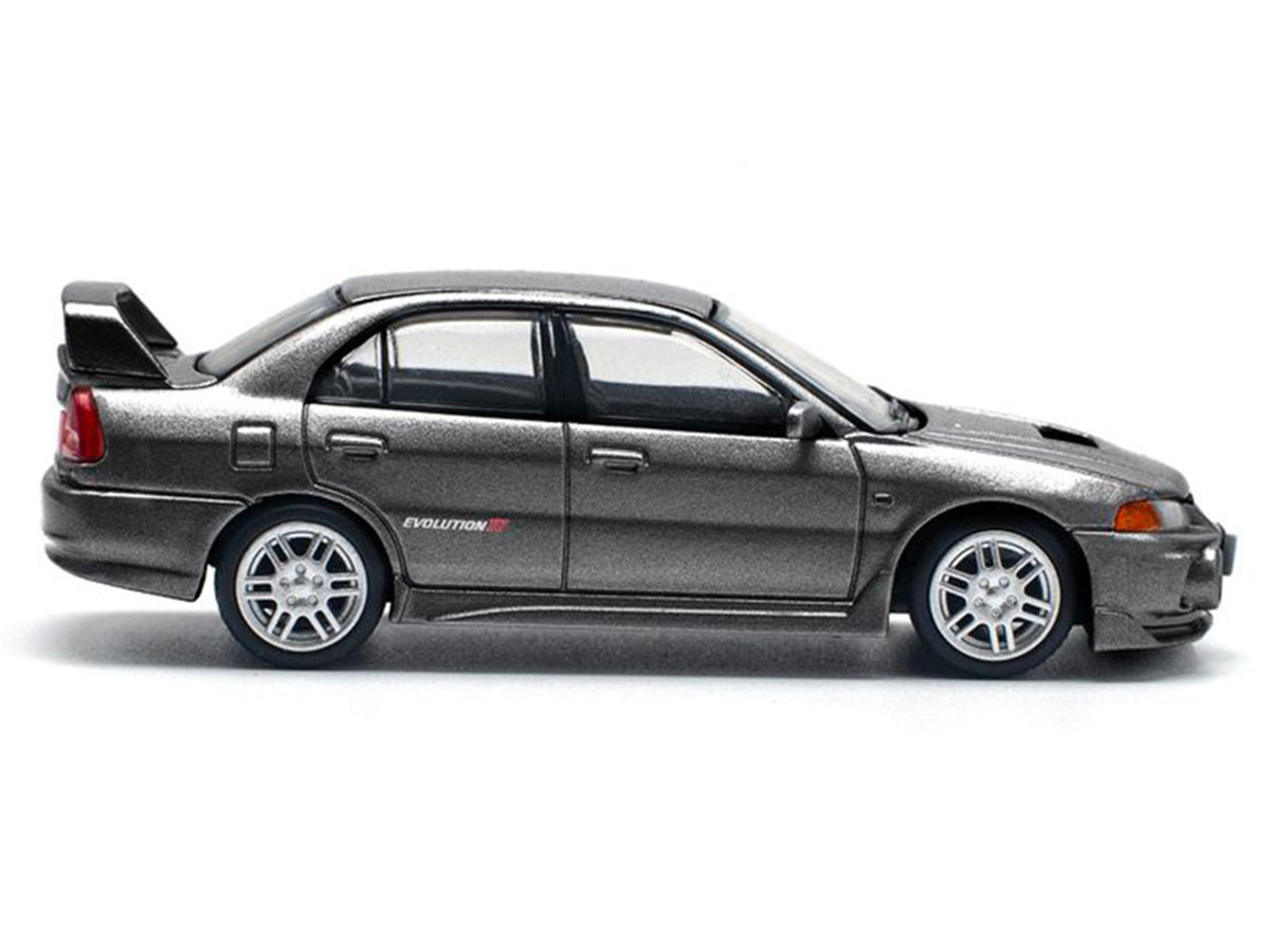 Mitsubishi Lancer Evolution IV RHD (Right Hand Drive) Dark Gray Metallic 1/64 Diecast Model Car