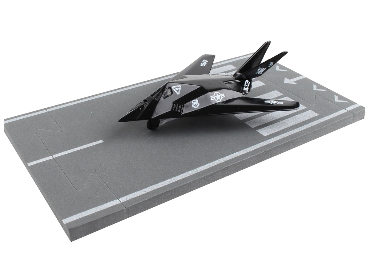 Lockheed F-117 Nighthawk Stealth Aircraft Black "United States Air Force" with Runway Section Diecast Model Airplane