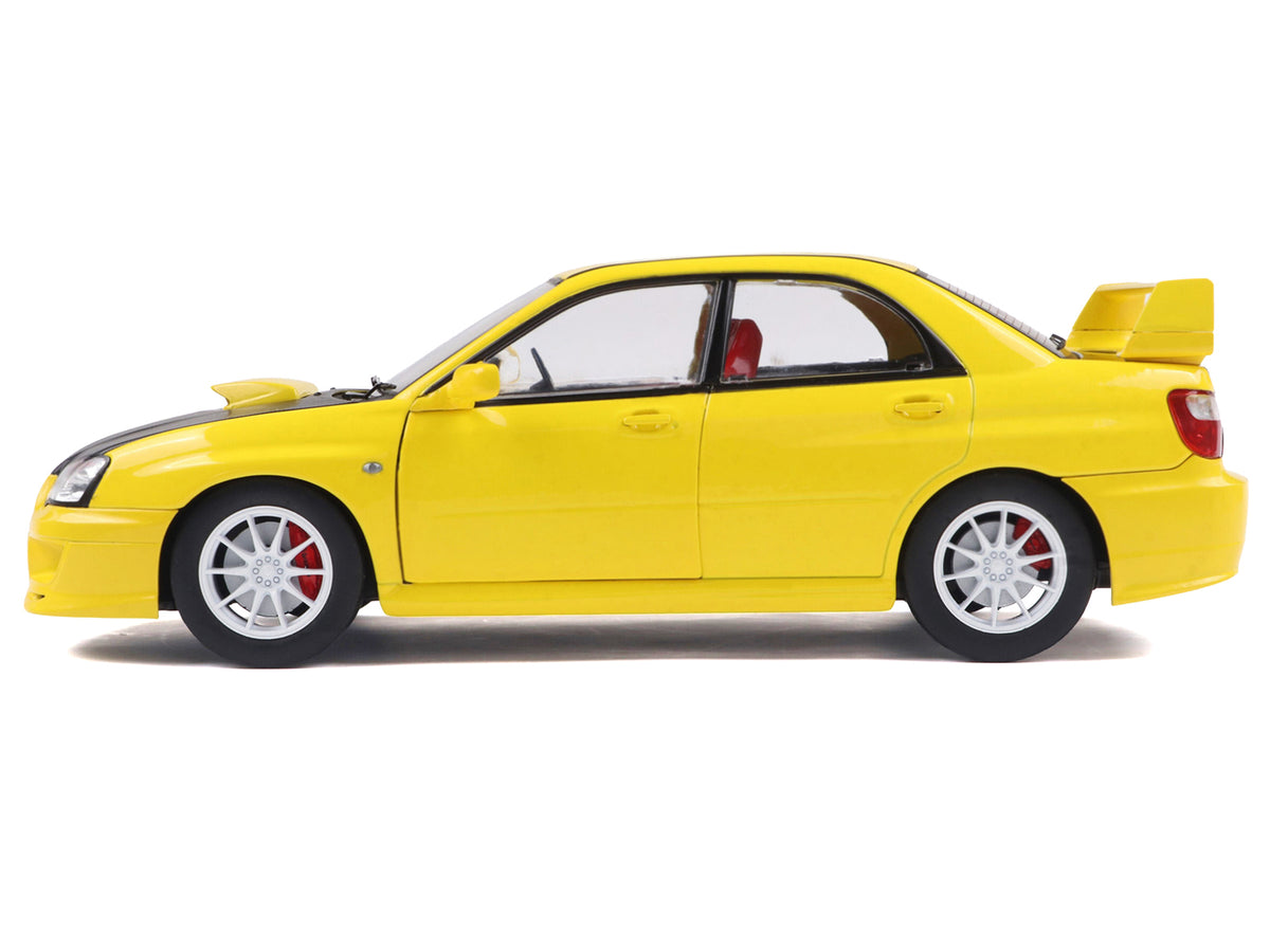 2003 Subaru Impreza WRX STI RHD (Right Hand Drive) Yellow with Carbon Hood 1/18 Diecast Model Car