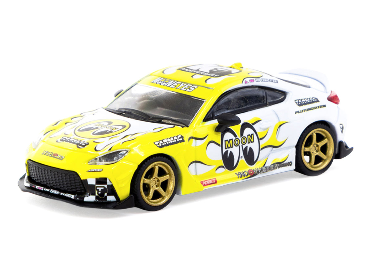Toyota GR86 RHD (Right Hand Drive) "MoonEyes" White with Yellow Flames and Graphics "Global64" Series 1/64 Diecast Model