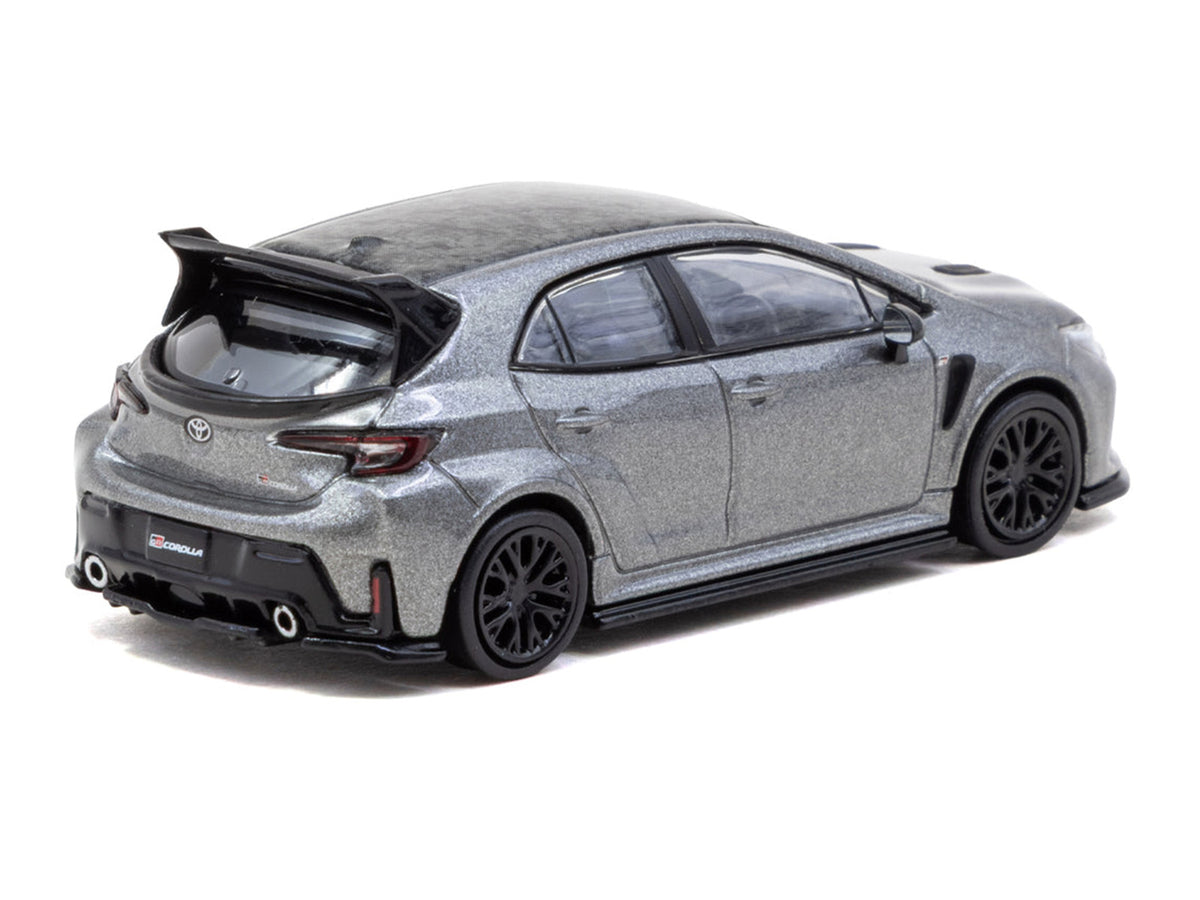 Toyota GR Corolla RHD (Right Hand Drive) Gray Metallic with Metal Oil Can Packaging "Global64" Series 1/64 Diecast Model Car