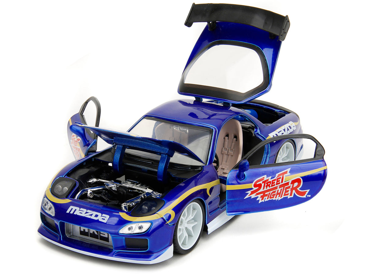 1993 Mazda RX-7 Candy Blue Metallic with Graphics and Chun-Li Diecast Figure "Street Fighter" Video Game "Anime Hollywood Rides" Series 1/24 Diecast Model Car