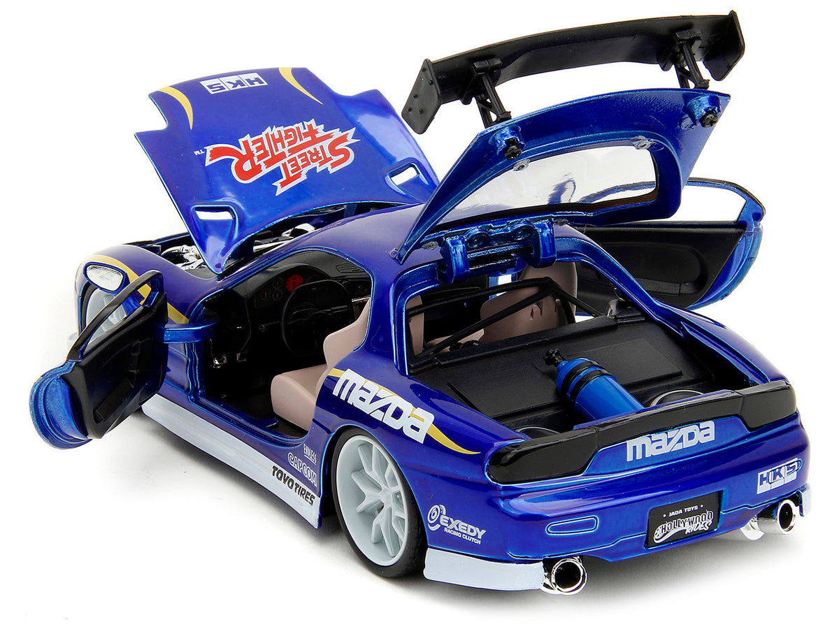 1993 Mazda RX-7 Candy Blue Metallic with Graphics and Chun-Li Diecast Figure "Street Fighter" Video Game "Anime Hollywood Rides" Series 1/24 Diecast Model Car