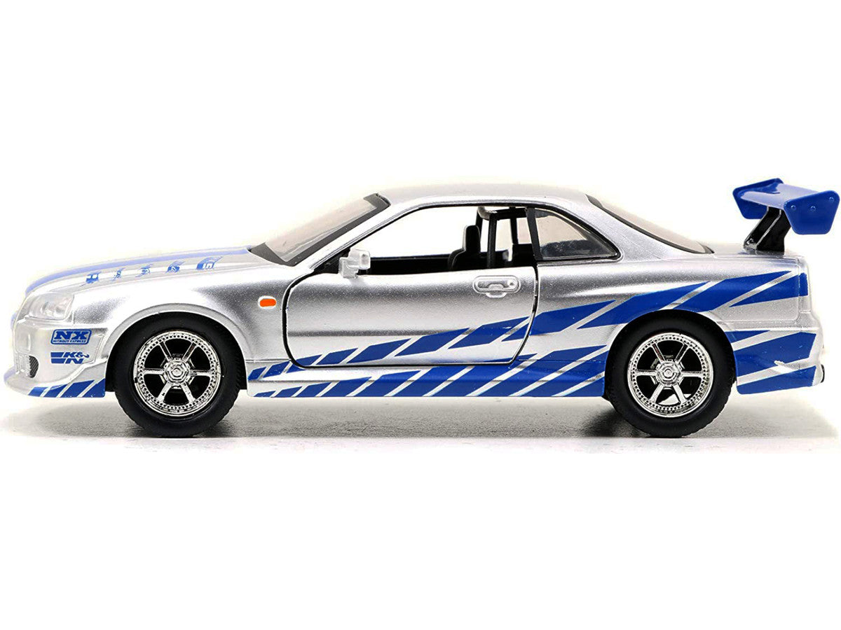Brian's Nissan Skyline GT-R (R34) RHD (Right Hand Drive) Silver Metallic with Blue Stripes "2 Fast 2 Furious" (2003) Movie "Fast & Furious 25th Anniversary" Series 1/32 Diecast Car Model