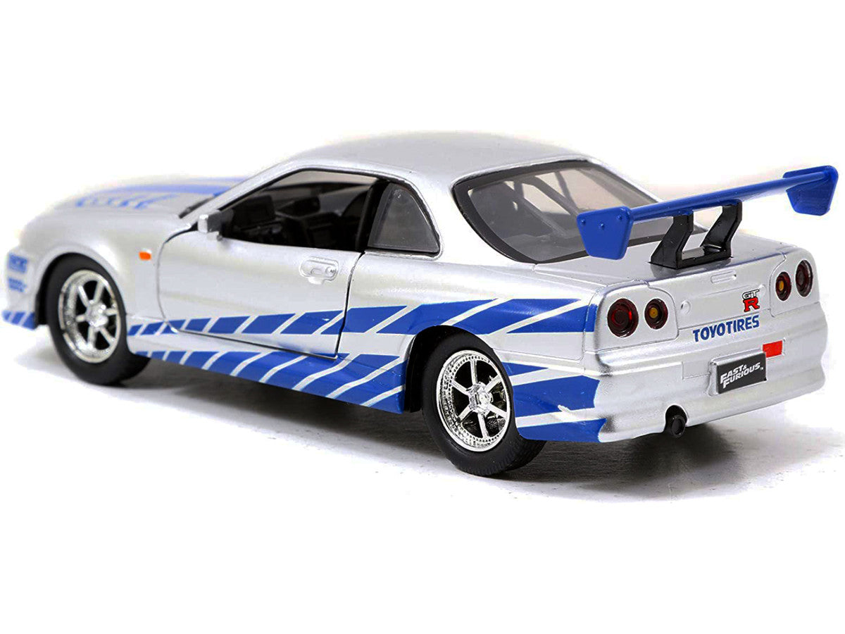 Brian's Nissan Skyline GT-R (R34) RHD (Right Hand Drive) Silver Metallic with Blue Stripes "2 Fast 2 Furious" (2003) Movie "Fast & Furious 25th Anniversary" Series 1/32 Diecast Car Model