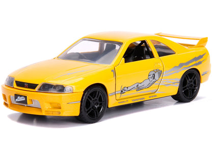 Leon's Nissan Skyline GT-R (BCNR33) Yellow Metallic with Graphics "Fast & Furious" Series 1/32 Diecast Model Car
